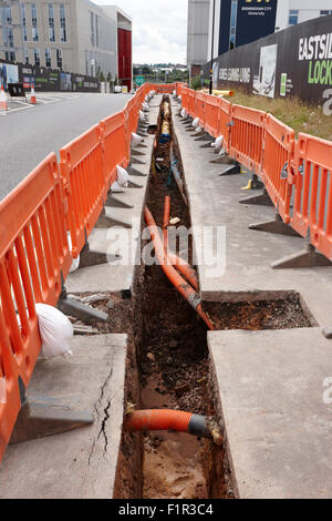 new services trench dug to lay gas and fibre optic infrastructure Birmingham UK Stock Photo