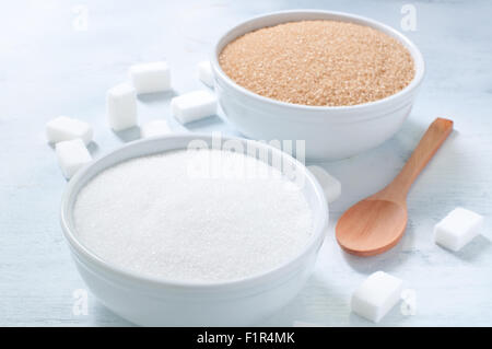 Different types of sugar: brown, white and refined sugar Stock Photo