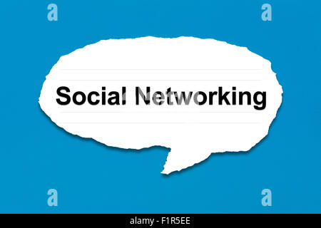 social networking with white paper tears on blue texture background Stock Photo