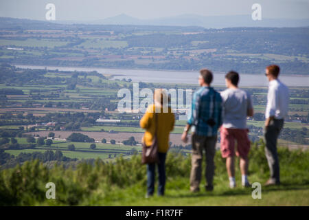 Gloucestershire, UK. 6th September, 2015. Visitors bask in the unseasonably warm September weather at a popular picnic site, Coaley Peak overlooking the Severn Vale and river Severn in Gloucestershire. Credit:  Wayne Farrell/Alamy Live News Stock Photo