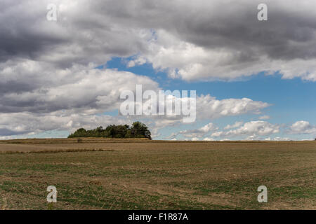 Dramatic grey nimbus clouds in the sky over fields Lower Silesia Poland Stock Photo
