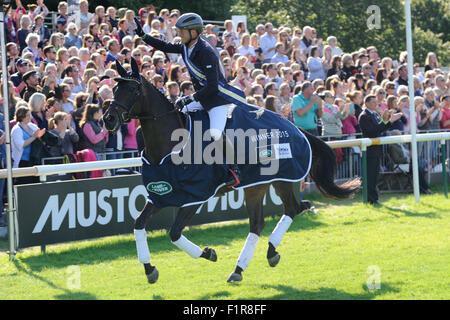 Stamford, UK. 6th September, 2015. The Land Rover Burghley Horse Trials. Michael Jung (GER) riding LA BIOSTHETIQUE - SAM FBW after winning the 2015 Land Rover Burghley Horse Trials. The Land Rover Burghley Horse Trials take place 3rd - 6th September. Credit:  Jonathan Clarke/Alamy Live News Stock Photo
