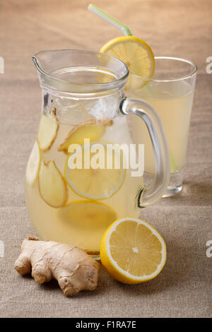 Jug of Shikanjvi homemade lemonade with lemon and ginger, spiced with cumin and saffron. Indian beverage known as nimbu pani or  Stock Photo