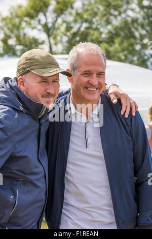 Steve Bull former professional football player for Wolves and England posing for photos with a fan at The Beckbury Show 2015 Stock Photo