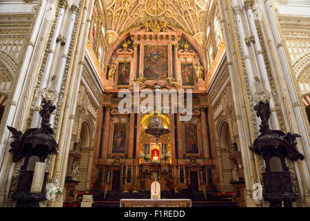 High main altar with carved wood lecterns of the Cordoba Our Lady of the Assumption Cathedral Mosque Stock Photo