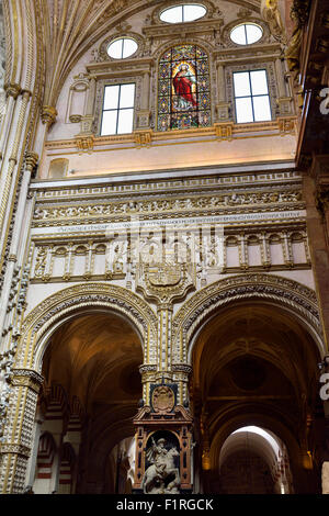 Statue of Saint James the Moor Slayer under the risen Christ in the Cordoba Cathedral Mosque Stock Photo