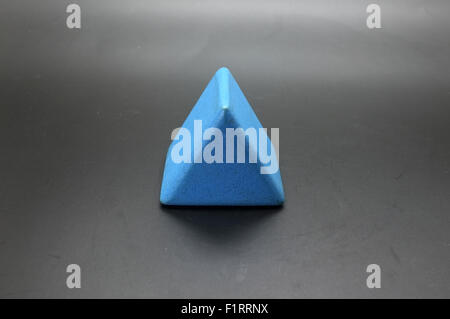 Toy wooden blue triangle blocks Stock Photo