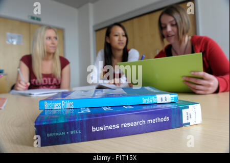 Business studies students in classroom Stock Photo