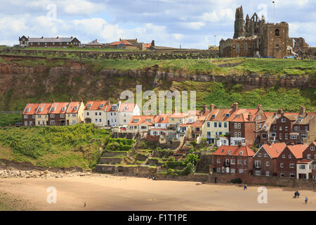 St. Mary's Church and Whitby Abbey above Tate Hill Beach, seen from West Cliff, Whitby, North Yorkshire, England, United Kingdom Stock Photo