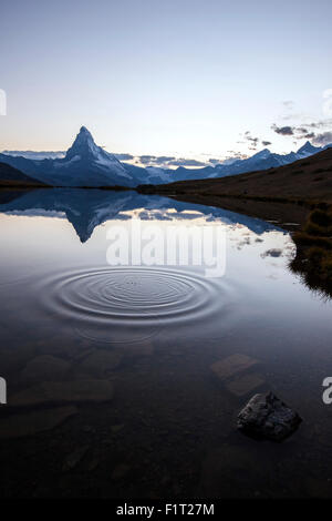 The Matterhorn reflected in Stellisee at sunset, Zermatt, Canton of Valais, Pennine Alps, Swiss Alps, Switzerland, Europe Stock Photo