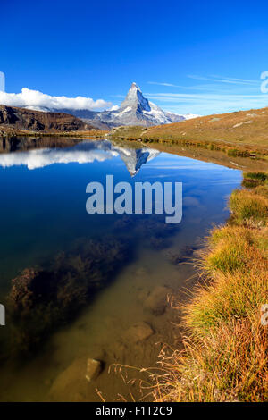 The Matterhorn reflected in Stellisee, Zermatt, Canton of Valais, Pennine Alps, Swiss Alps, Switzerland, Europe Stock Photo