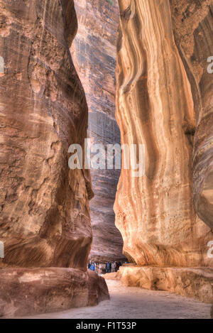 Tourists walking through the Siq, Petra, UNESCO World Heritage Site, Jordan, Middle East