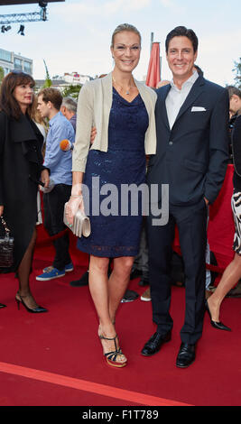 Hamburg, Germany. 06th Sep, 2015. German World Cup alpine ski racer Maria Hoefl-Riesch and her husband pose during the charity gala 'Night of the Legends' in Hamburg, Germany, 06 September 2015. The gala which benefits the association 'Nestwerk fuer Jugendprojekte' (lit. Nestwork [as in network] for youth) takes place for the 11th time. Photo: Georg Wendt/dpa/Alamy Live News Stock Photo