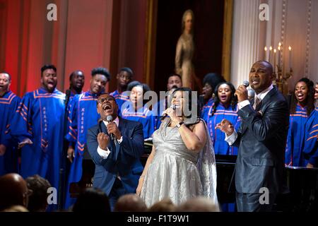 Legendary singer Aretha Franklin performs onstage during The Gospel Tradition: In Performance at the White House in the East Room of the White House April 14, 2015 in Washington, DC. Stock Photo