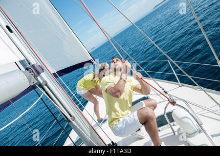 Young couple together on sailboat, Adriatic Sea Stock Photo