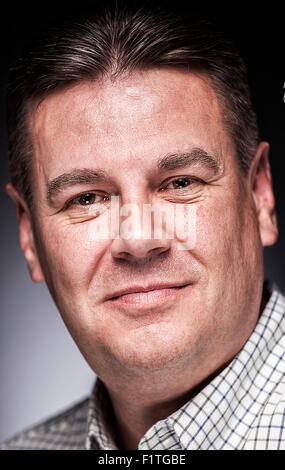 A black and white portrait of a white male in his 40's. Stock Photo