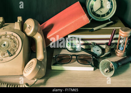 Phone and the work place in a mess on the table. Stock Photo