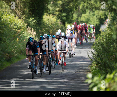 Downham village, Lancashire, UK. 7th September, 2015. Stage 2 Aviva Tour of Britain cycle race in the Ribble Valley, Lancashire. Team Sky at the head of the peloton. Credit:  STEPHEN FLEMING/Alamy Live News Stock Photo