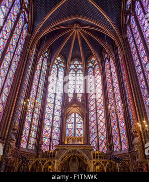 Front of Sainte Chapelle with Altar. Soaring windows of stained glass surround the altar of this restored 13 Century chapel. Stock Photo