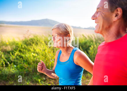 Senior couple running Stock Photo