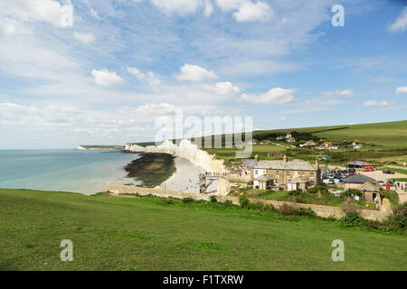 Iconic white cliffs along the Sussex coast at beachy head. South downs meet the English channel Stock Photo