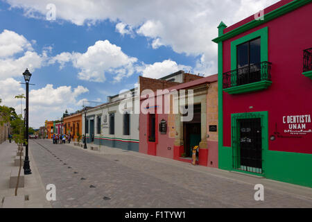 Colorfully painted houses and shops line the streets in OAXACA, MEXICO Stock Photo