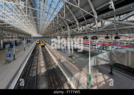 The inside of Manchester Piccadilly railway train station on a sunny day. Stock Photo