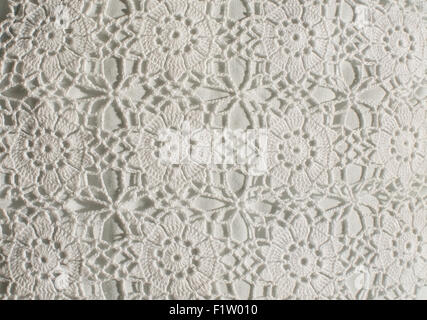 White crochet pattern with flower circles background Stock Photo