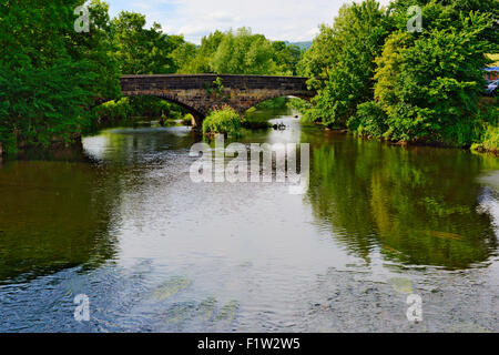 Old stone double arch bridge over river Aire, Apperley Bridge, Bradford, West Yorkshire, UK. Bridge is Apperley Lane, Stock Photo