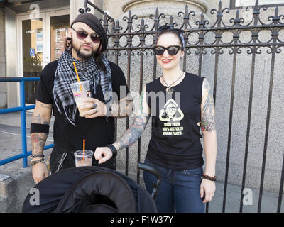 Hip couple in the Williamsburg section of Brooklyn, New York, August, 2015. Stock Photo