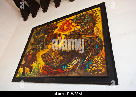 Painting of Saint Geroge fighting a dragon in a government building - OAXACA, MEXICO Stock Photo