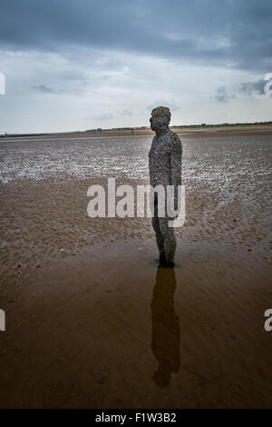 Antony Gormley Another Place, barnacle covered sculptures on Crosby Beach Stock Photo