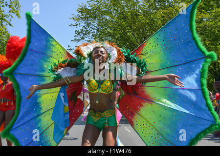 Brooklyn, United States. 07th Sep, 2015. A dancer sports a butterfly-themed costume. Massive crowds gathered along the Eastern Parkway in Crown Heights, Brooklyn to witness the annual West Indian Day Carnival Parade featuring politicians, dancers and all manner of display of Caribbean heritage. Credit:  Albin Lohr-Jones/Pacific Press/Alamy Live News Stock Photo