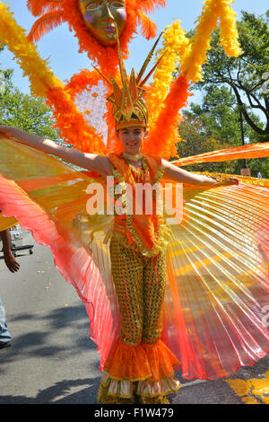 Brooklyn, United States. 07th Sep, 2015. A young girl marches in an elaborately conceived costume. Massive crowds gathered along the Eastern Parkway in Crown Heights, Brooklyn to witness the annual West Indian Day Carnival Parade featuring politicians, dancers and all manner of display of Caribbean heritage. Credit:  Albin Lohr-Jones/Pacific Press/Alamy Live News Stock Photo