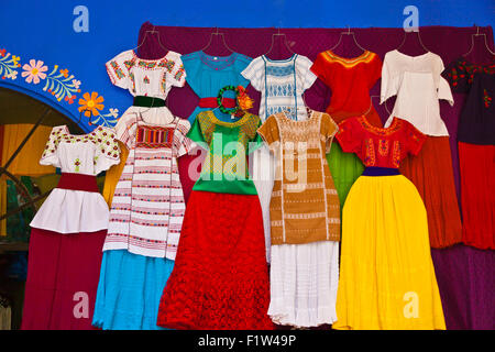Traditional hand made dresses on display - OAXACA, MEXICO Stock Photo