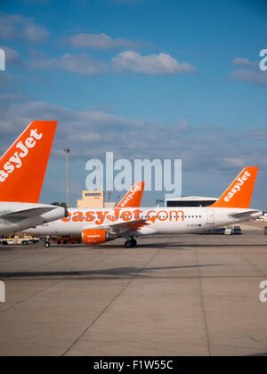 EasyJet aircraft lined up on the tarmac of Palma Airport, Mallorca, Spain Stock Photo
