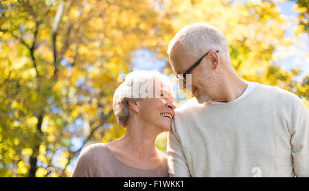 happy senior couple in autumn park Stock Photo