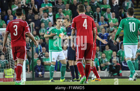 Windsor Park, Belfast, UK. 7th September, 2015. Northern Ireland defender Chris Baird is surprised as referee Cüneyt Çakιr sends him off in the game against Hungary. David Hunter/Alamy Live News. Stock Photo