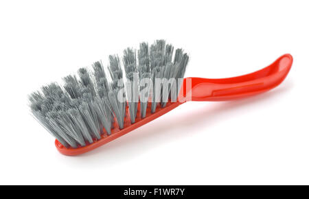 Red plastic cleaning brush isolated on white Stock Photo