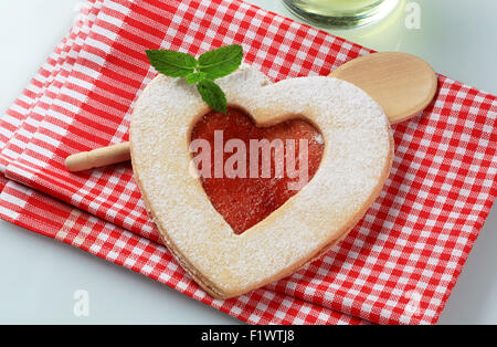 Heart shaped  Linzer cookie with jam filling Stock Photo