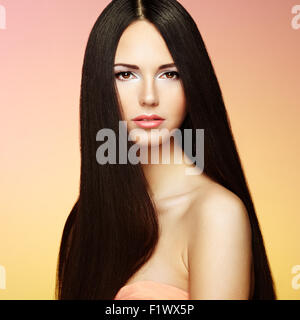 Beautiful brunette woman with long hair. Beauty photo Stock Photo