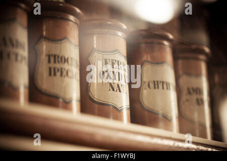 vintage medications in small bottles of retro pharmacy Stock Photo