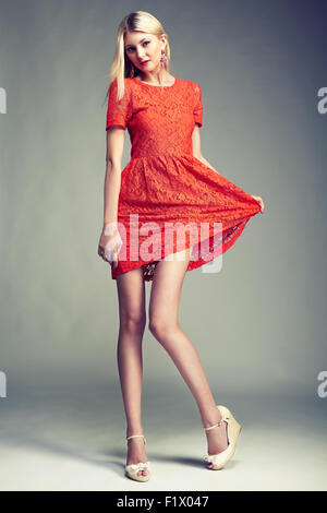 Fashion photo of young magnificent woman. Girl posing. Studio photo Stock Photo