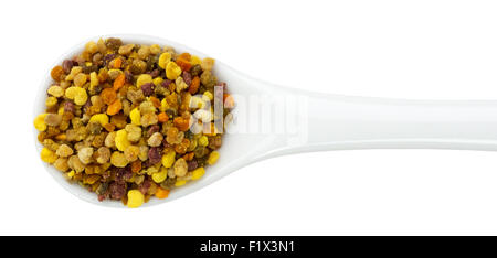 bee pollen in spoon isolated on the white background. Stock Photo