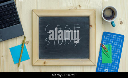 Case study written on a chalkboard at the office Stock Photo