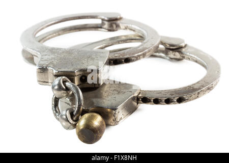 retro handcuffs isolated on the white background. Stock Photo