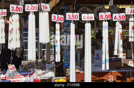 Stall selling candles and religious souvenirs Padova Padua Veneto Italy Europe Stock Photo