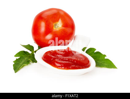 tomato with ketchup on the white background. Stock Photo