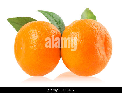 ripe tangerines with leaves isolated on white. Stock Photo