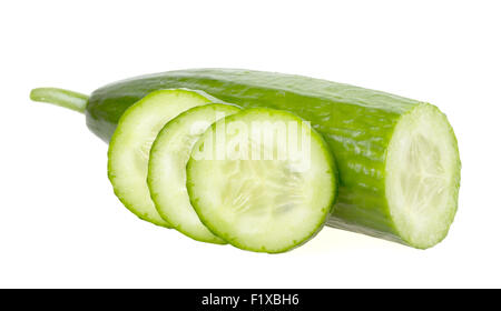 Cucumber and slices isolated over white background. Stock Photo